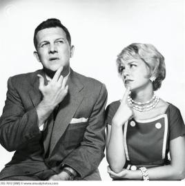 Close-up of a young couple looking confused